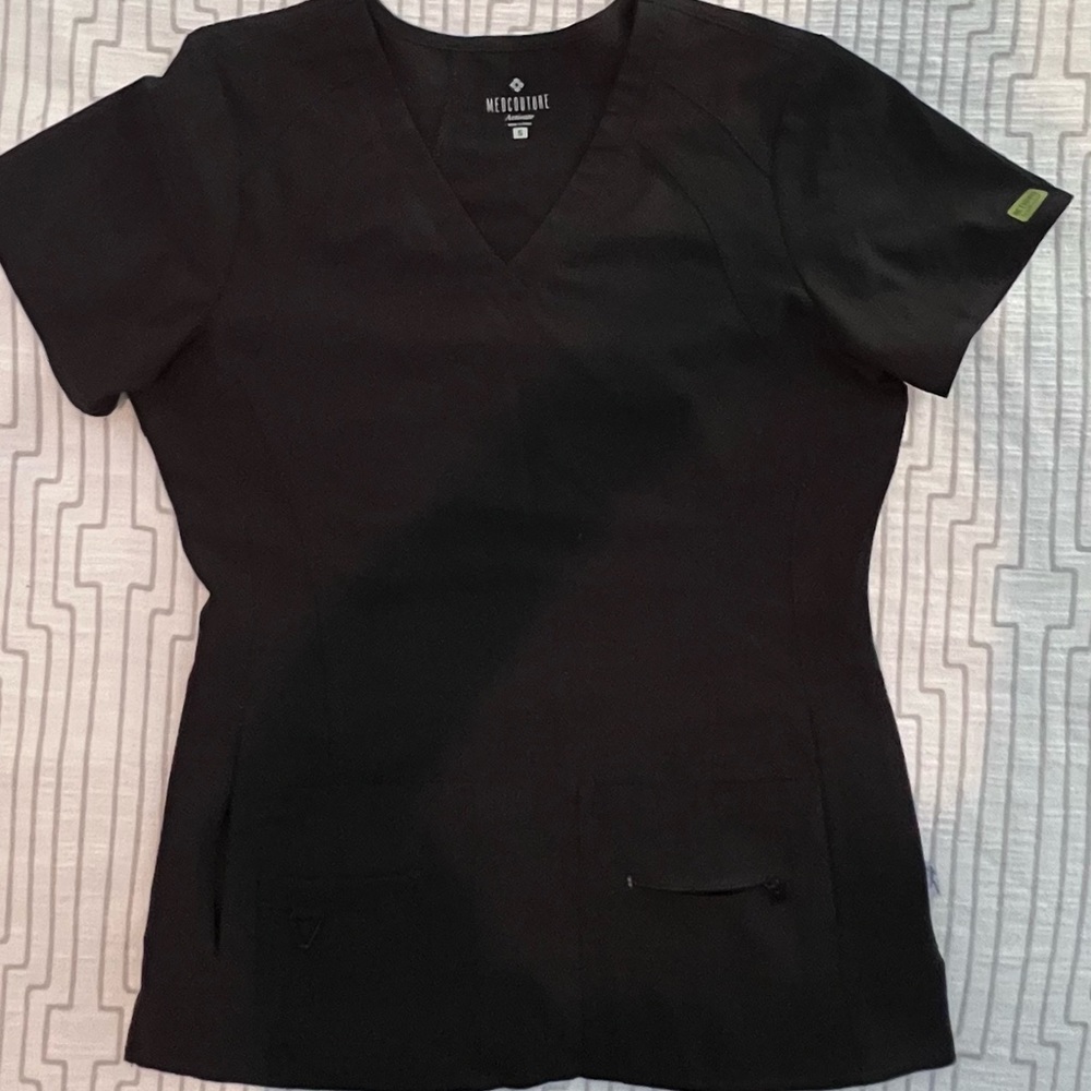 Worn only a few times. Comfortable, flexible, easy clean and dry scrub top
